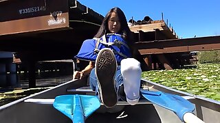 Showing feet in canoe